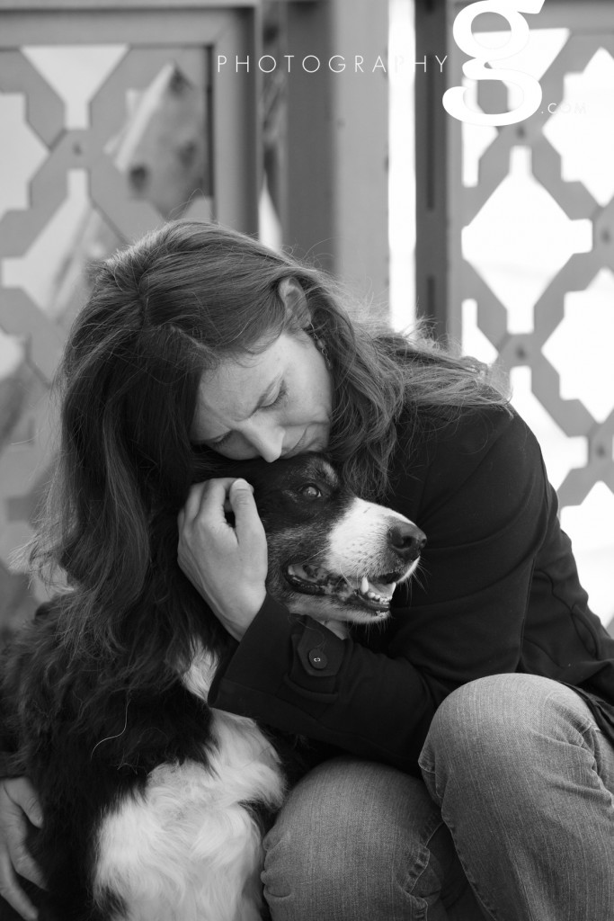 Girl hugging her dog